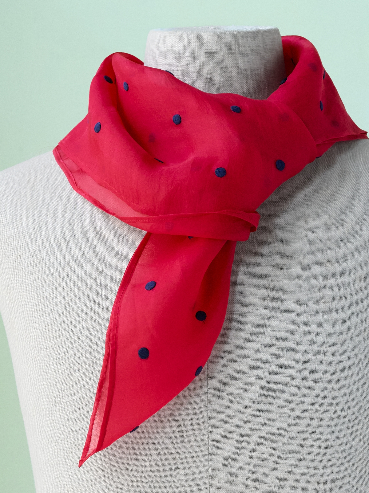 Navy dots on red